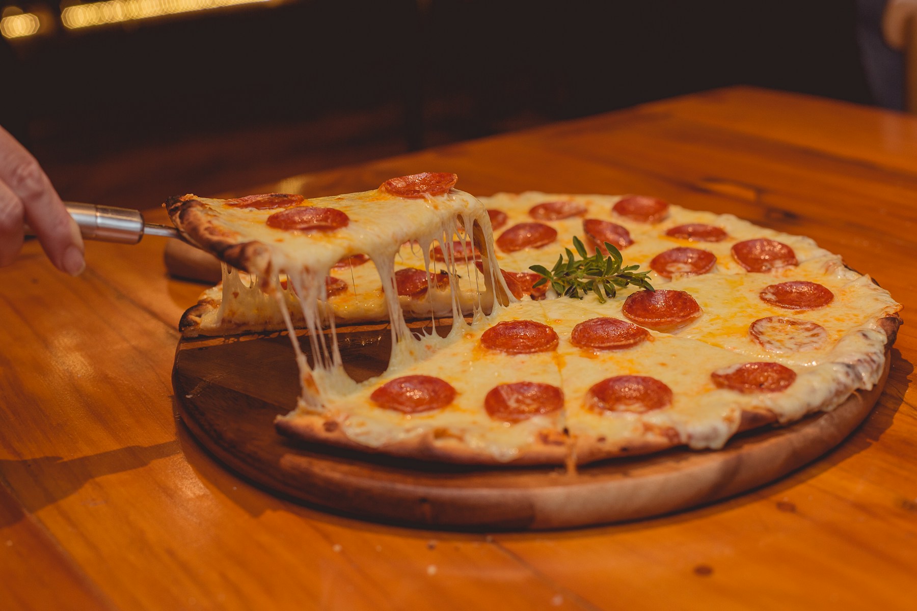 Pizza served on a dining table
